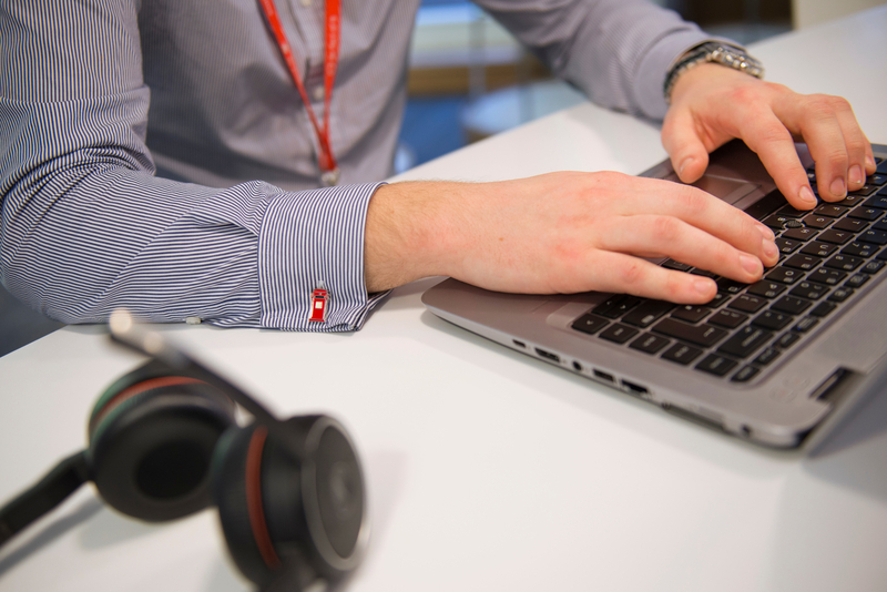 Man at laptop with headphones
